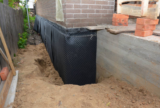 SJ Waterproofing Pros technician performing targeted Exterior Waterproofing assessment in Gore, VA